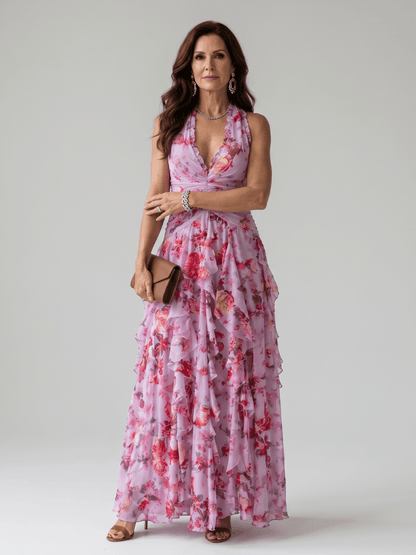 Floral maxi dress with halter neck and ruched bodice, perfect lightweight summer dress for wedding guests, featuring vibrant colors and elegant design. 0