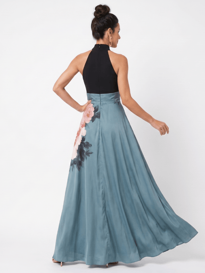 Floral maxi dress with halter neckline and front slit, perfect for elegant evening wear, crafted from smooth fluid fabric. 3