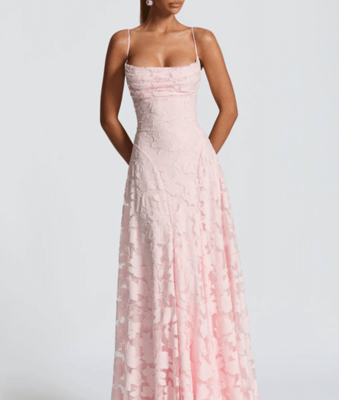 Floral maxi dress featuring a lace-up back and spaghetti straps, crafted from textured fabric, perfect for elegant occasions. 4