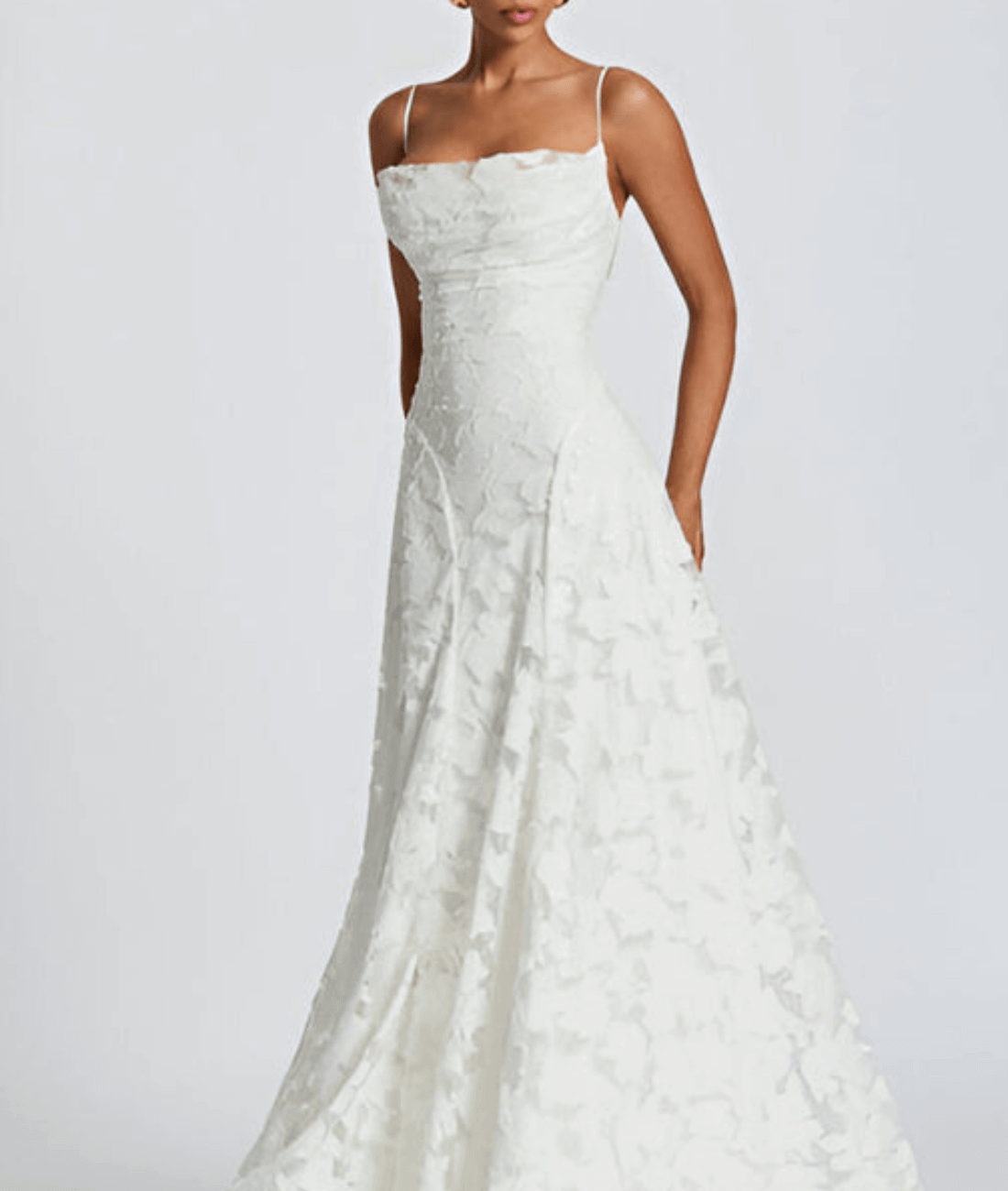 Floral maxi dress featuring a lace-up back and spaghetti straps, crafted from textured fabric, perfect for elegant occasions. 0