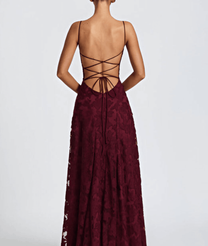 Floral maxi dress featuring a lace-up back and spaghetti straps, crafted from textured fabric, perfect for elegant occasions. 3