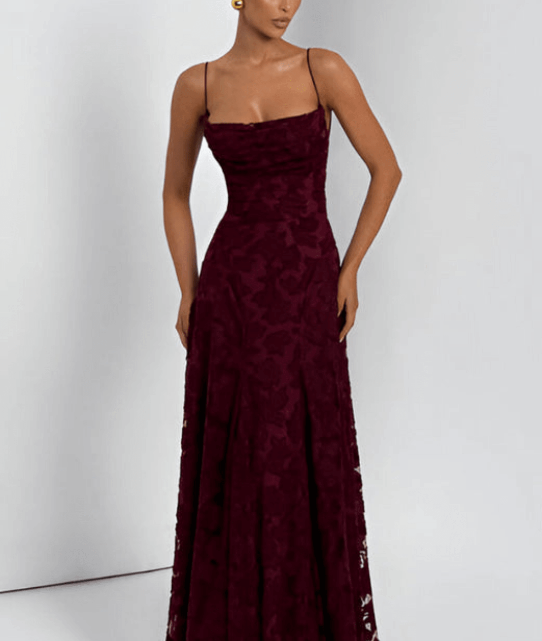 Floral maxi dress featuring a lace-up back and spaghetti straps, crafted from textured fabric, perfect for elegant occasions. 2