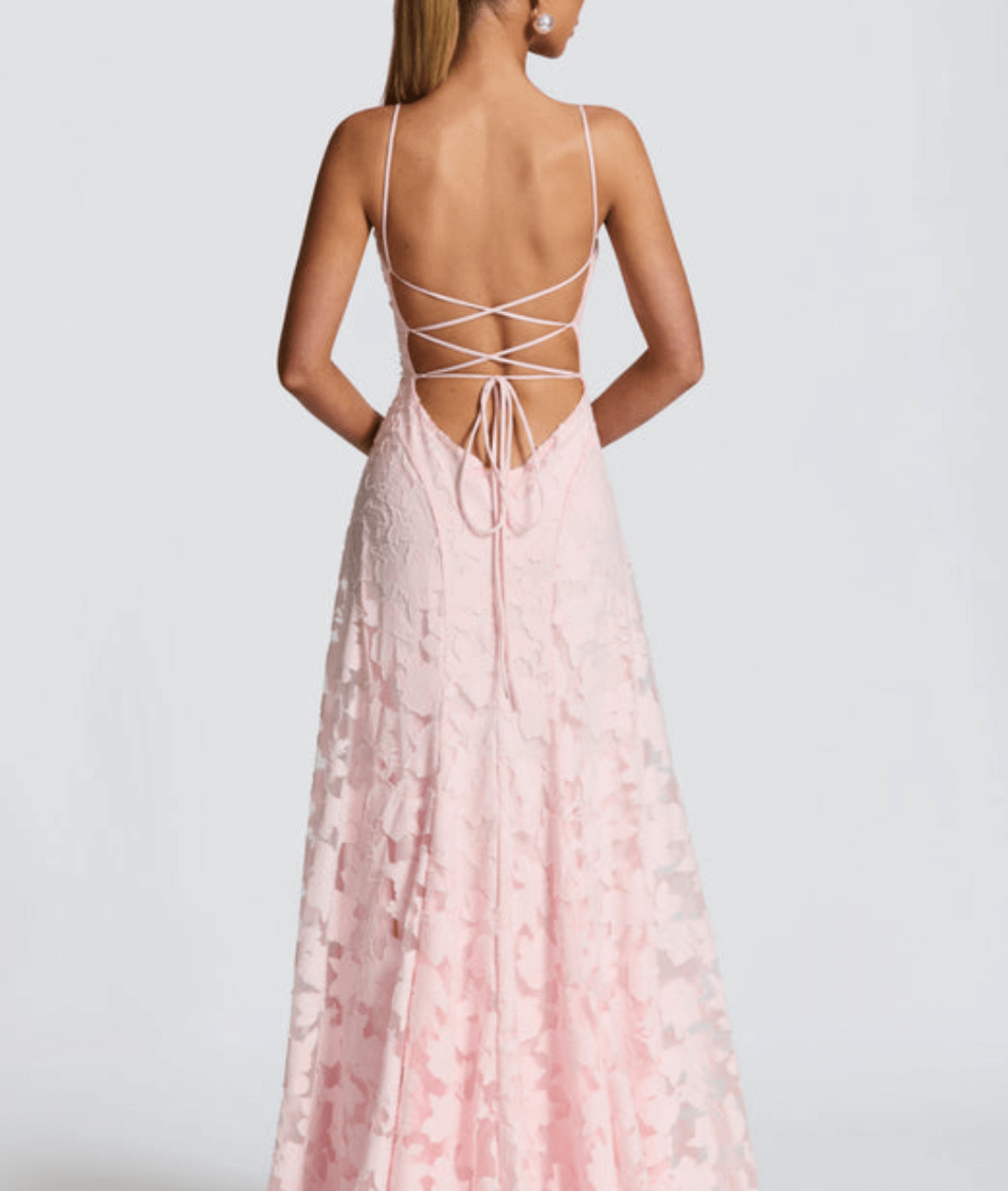 Floral maxi dress featuring a lace-up back and spaghetti straps, crafted from textured fabric, perfect for elegant occasions. 5