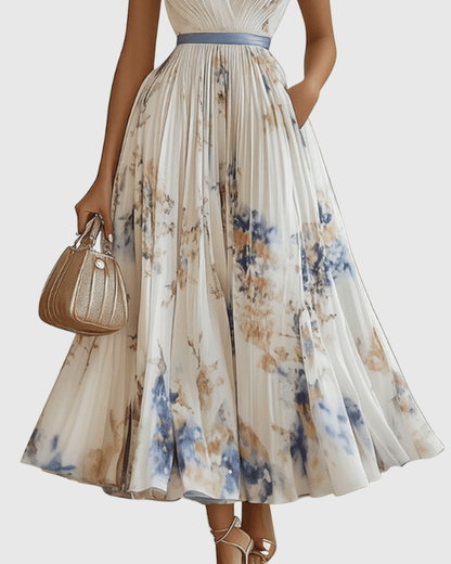 Elegant floral maxi dress featuring long sleeves and a ribbon-tie waist, designed with a flattering V-neckline for women. 2