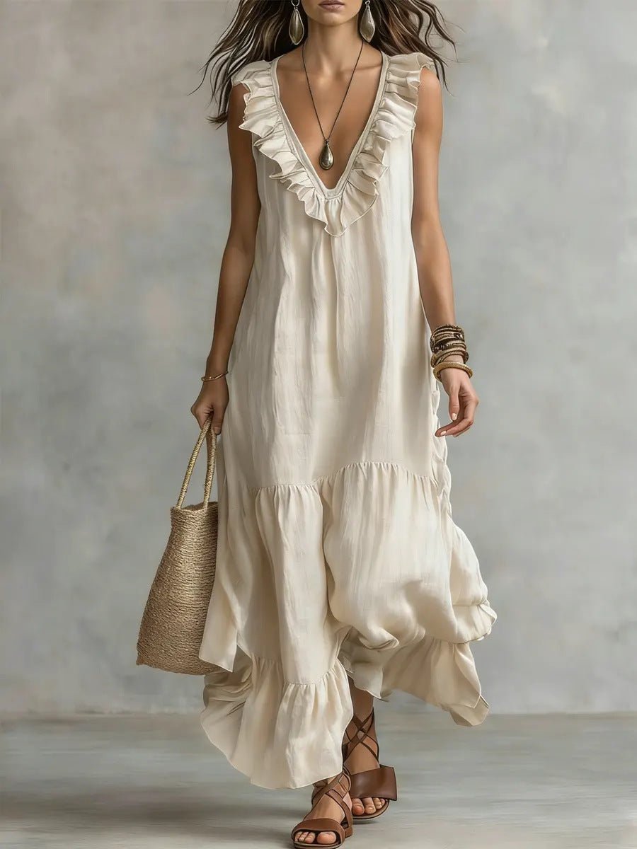 Floral maxi dress featuring ruffle details and an irregular hem, perfect for casual vacation style in lightweight fabric. 4