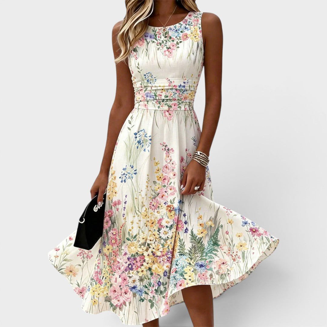 Floral midi dress featuring a vibrant watercolor print and cinched waist, perfect for summer weddings and special occasions. 0