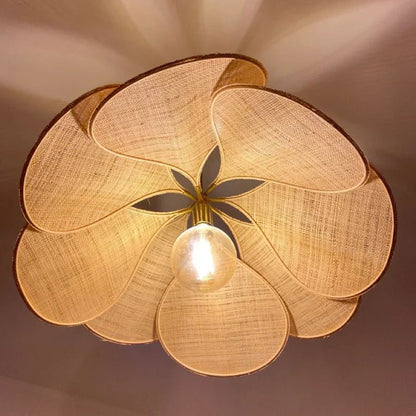 Flower-shaped hanging lamp featuring a warm light design, crafted from fabric and metal, ideal for enhancing the ambiance of living rooms and dining rooms. 5