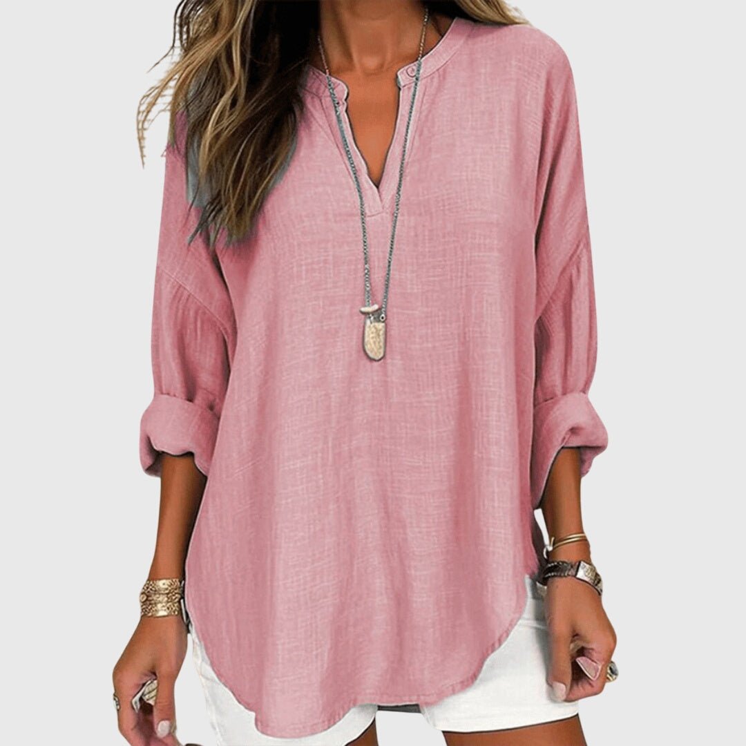 Flowy beach shirt featuring an elegant design, long sleeves, and breathable fabric, perfect for stylish summer outings and beach days. 3
