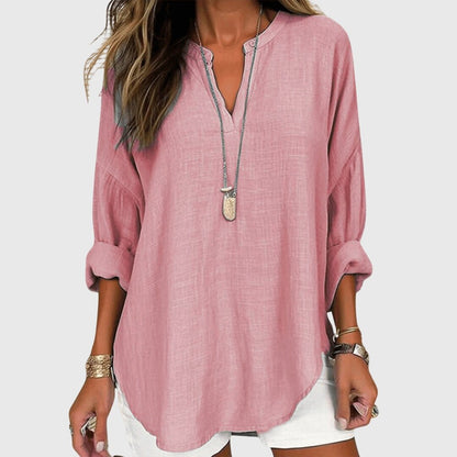 Flowy beach shirt featuring an elegant design, long sleeves, and breathable fabric, perfect for stylish summer outings and beach days. 3