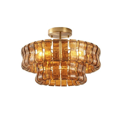 Flush mount ceiling light featuring a hand-crafted glass design and sturdy metal frame, available in clear, smoke grey, green, or amber, perfect for modern 18