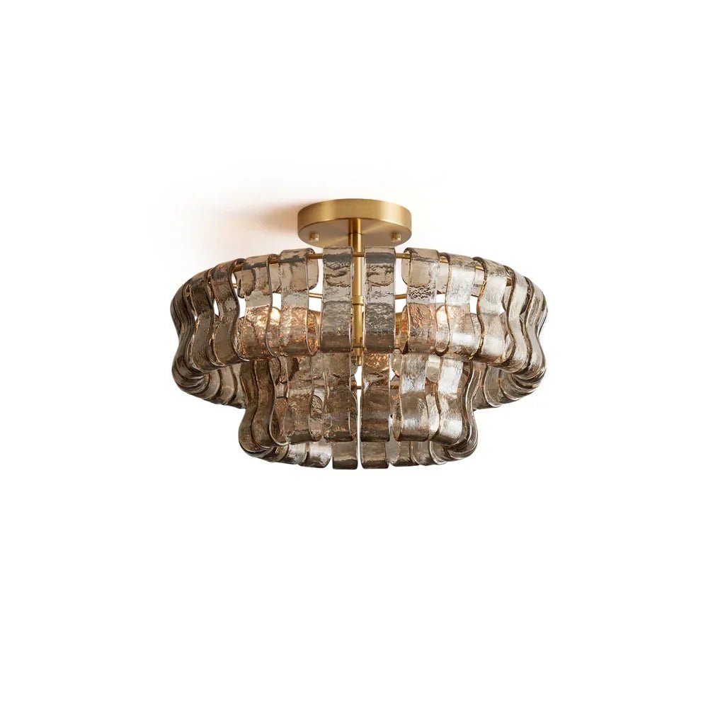 Flush mount ceiling light featuring a hand-crafted glass design and sturdy metal frame, available in clear, smoke grey, green, or amber, perfect for modern 2