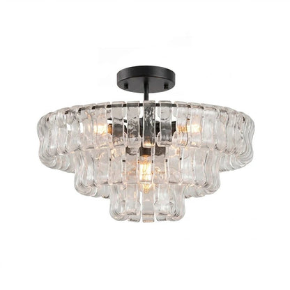 Flush mount ceiling light featuring a hand-crafted glass design and sturdy metal frame, available in clear, smoke grey, green, or amber, perfect for modern 9