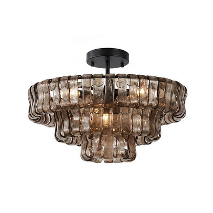 Flush mount ceiling light featuring a hand-crafted glass design and sturdy metal frame, available in clear, smoke grey, green, or amber, perfect for modern 19