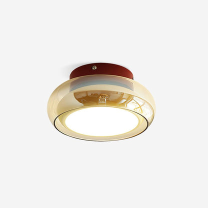 Flush mount ceiling light featuring a sleek modern metal design, integrated LED technology, and a round glass shade, perfect for enhancing the ambiance of bedrooms and living 7