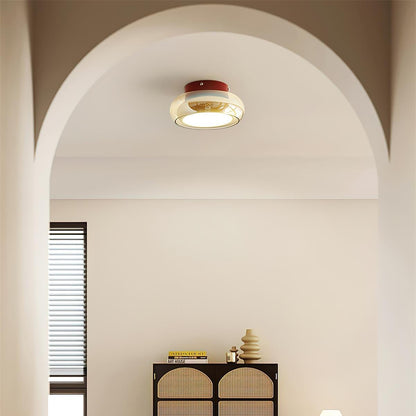 Flush mount ceiling light featuring a sleek modern metal design, integrated LED technology, and a round glass shade, perfect for enhancing the ambiance of bedrooms and living 2