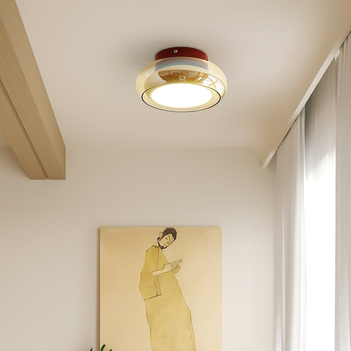 Flush mount ceiling light featuring a sleek modern metal design, integrated LED technology, and a round glass shade, perfect for enhancing the ambiance of bedrooms and living 3