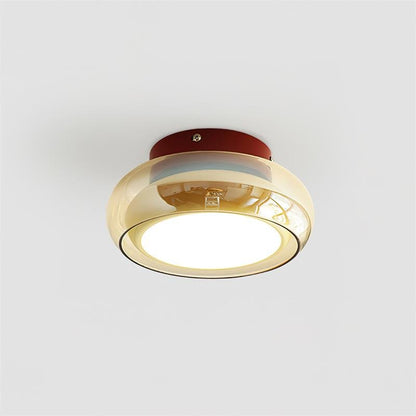 Flush mount ceiling light featuring a sleek modern metal design, integrated LED technology, and a round glass shade, perfect for enhancing the ambiance of bedrooms and living 0