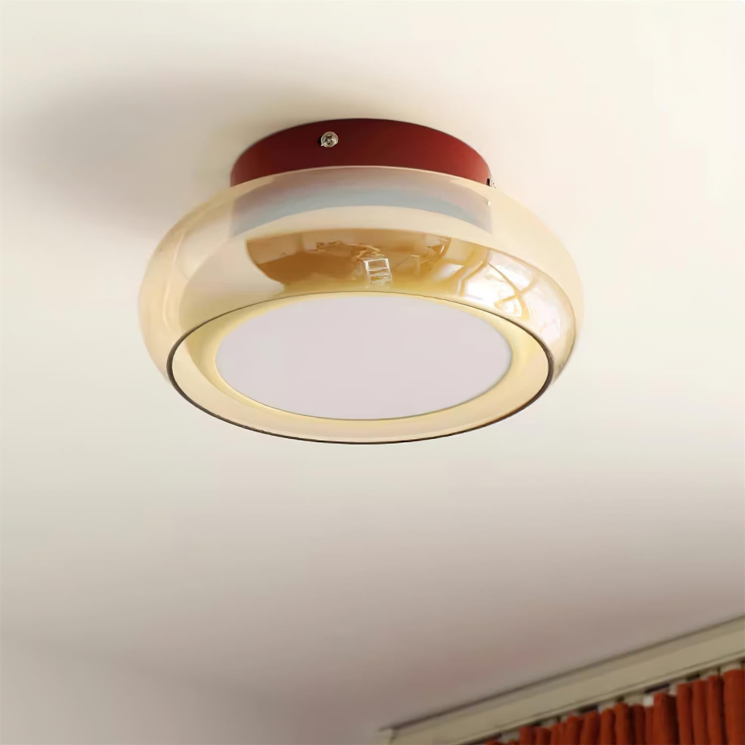 Flush mount ceiling light featuring a sleek modern metal design, integrated LED technology, and a round glass shade, perfect for enhancing the ambiance of bedrooms and living 8