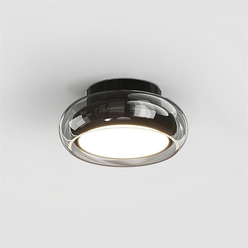 Flush mount ceiling light featuring a sleek modern metal design, integrated LED technology, and a round glass shade, perfect for enhancing the ambiance of bedrooms and living 6