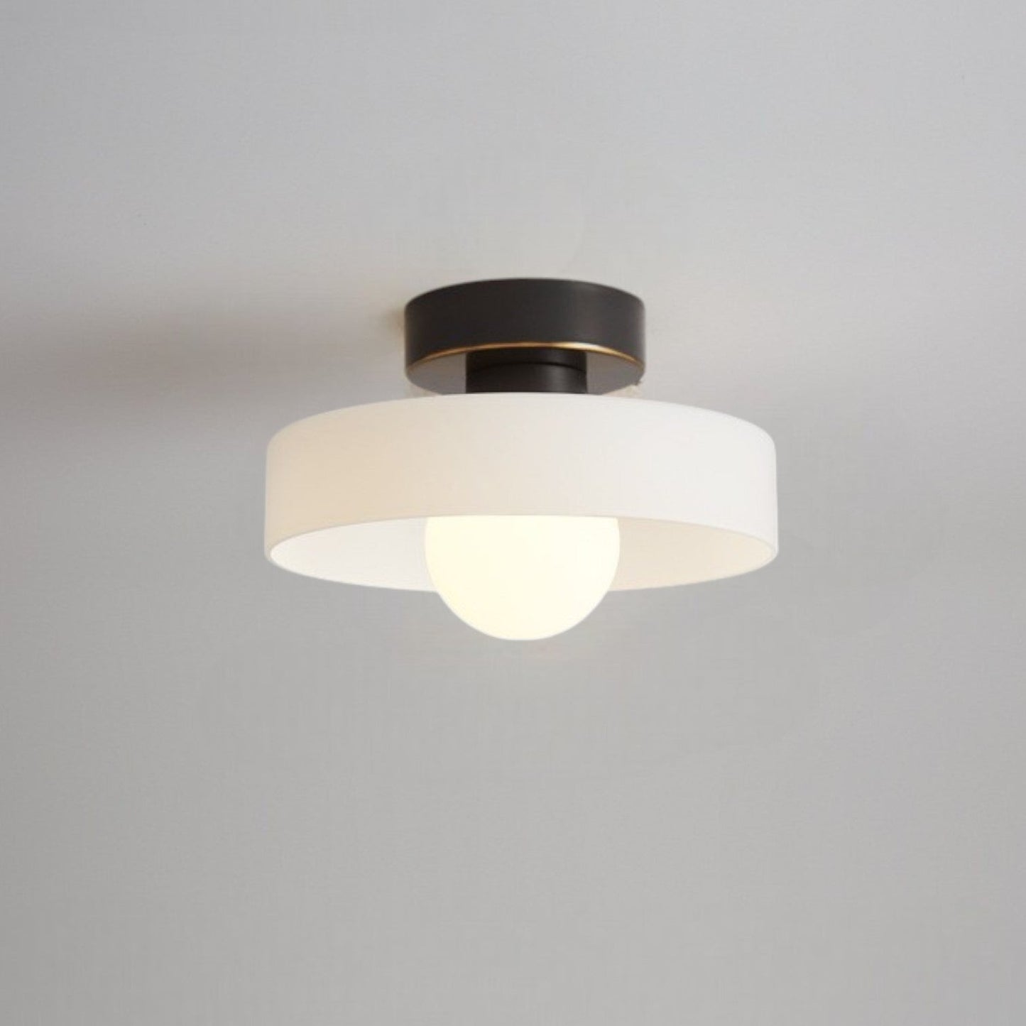 Modern brass and glass flush mount ceiling light designed for dining rooms or halls, featuring LED compatibility for energy-efficient illumination. 0