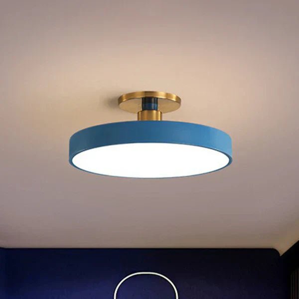 Flush mount ceiling light featuring soft LED illumination, designed in a minimalist Nordic style with a sleek acrylic finish, perfect for modern home decor. 2