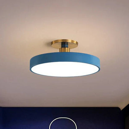 Flush mount ceiling light featuring soft LED illumination, designed in a minimalist Nordic style with a sleek acrylic finish, perfect for modern home decor. 2