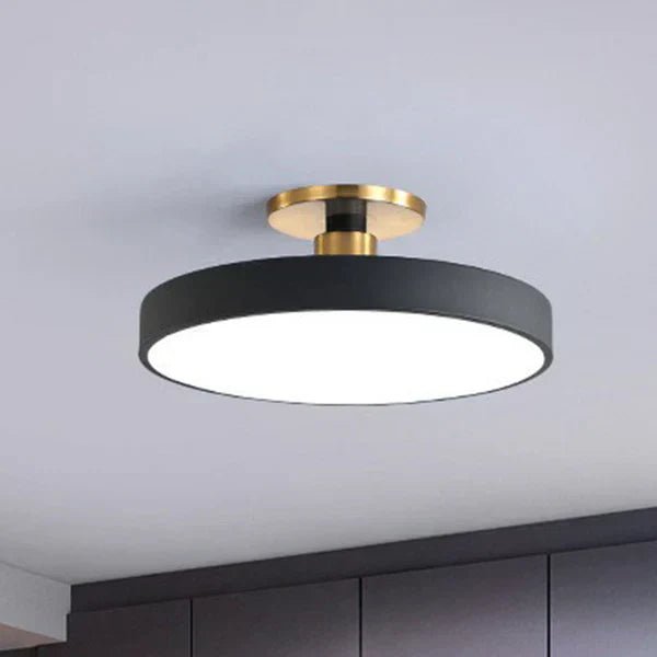 Flush mount ceiling light featuring soft LED illumination, designed in a minimalist Nordic style with a sleek acrylic finish, perfect for modern home decor. 4