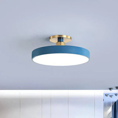 Flush mount ceiling light featuring soft LED illumination, designed in a minimalist Nordic style with a sleek acrylic finish, perfect for modern home decor. 8