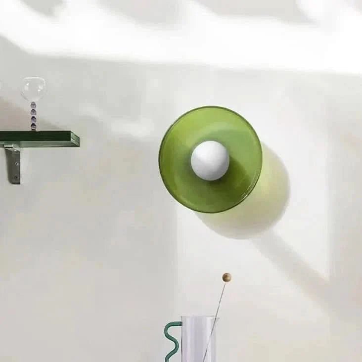Flush mount ceiling light featuring a sleek Scandinavian glass design, emitting soft, warm lighting, perfect for enhancing modern interior spaces. 4