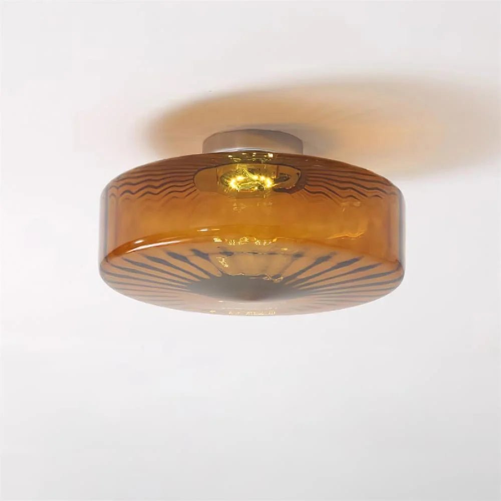 Flush mount ceiling light featuring a tri-color LED system and an elegant amber glass shade, complemented by a sleek chrome finish, ideal for versatile indoor lighting solutions 0