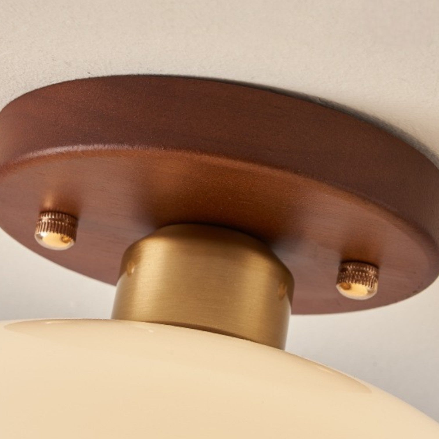 Flush mount ceiling light featuring a warm glow, elegant wooden accent, and a Bauhaus style opal glass shade, perfect for enhancing the ambiance of bedrooms 4