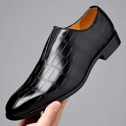 Genuine leather loafers with a cushioned insole and lustrous finish, perfect for formal occasions and everyday wear. 4
