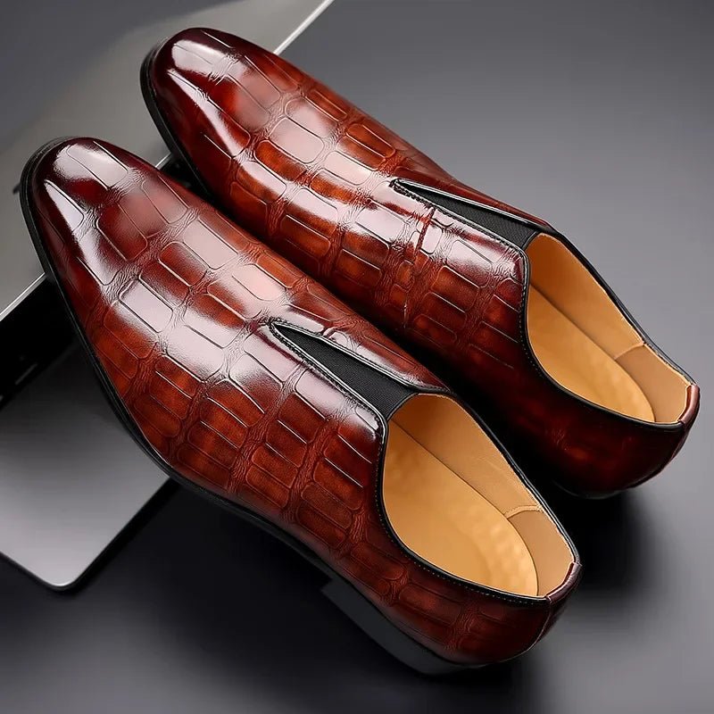 Genuine leather loafers with a cushioned insole and lustrous finish, perfect for formal occasions and everyday wear. 3