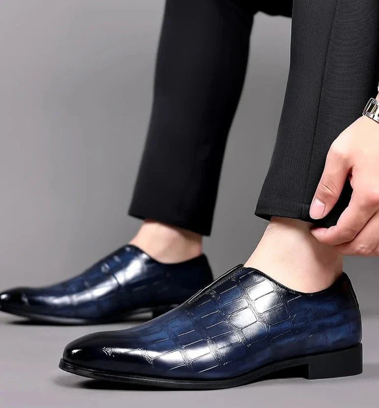Genuine leather loafers with a cushioned insole and lustrous finish, perfect for formal occasions and everyday wear. 7