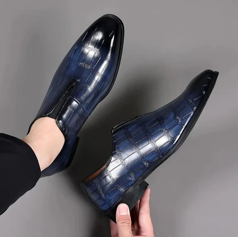 Genuine leather loafers with a cushioned insole and lustrous finish, perfect for formal occasions and everyday wear. 8