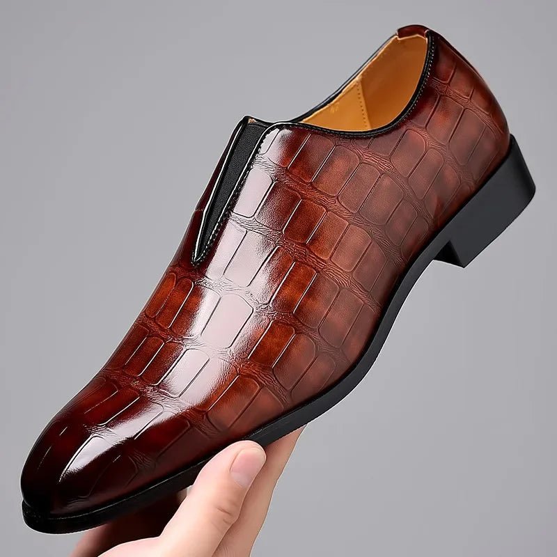 Genuine leather loafers with a cushioned insole and lustrous finish, perfect for formal occasions and everyday wear. 0