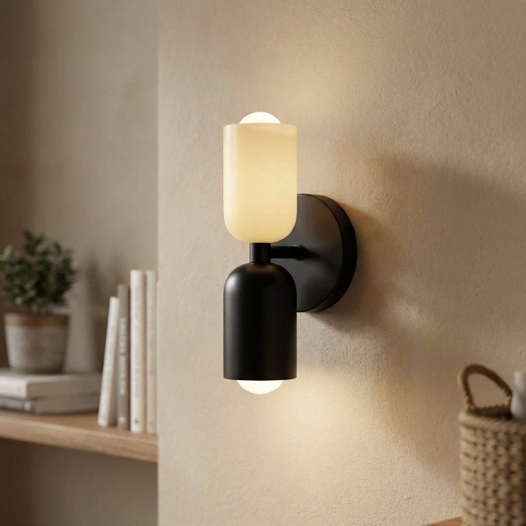 Geometric wall lamp featuring a sleek metal frame and frosted glass shade, providing soft ambient light for modern home decor. 1