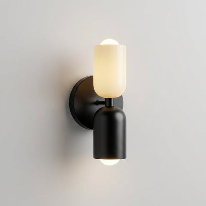 Geometric wall lamp featuring a sleek metal frame and frosted glass shade, providing soft ambient light for modern home decor. 2