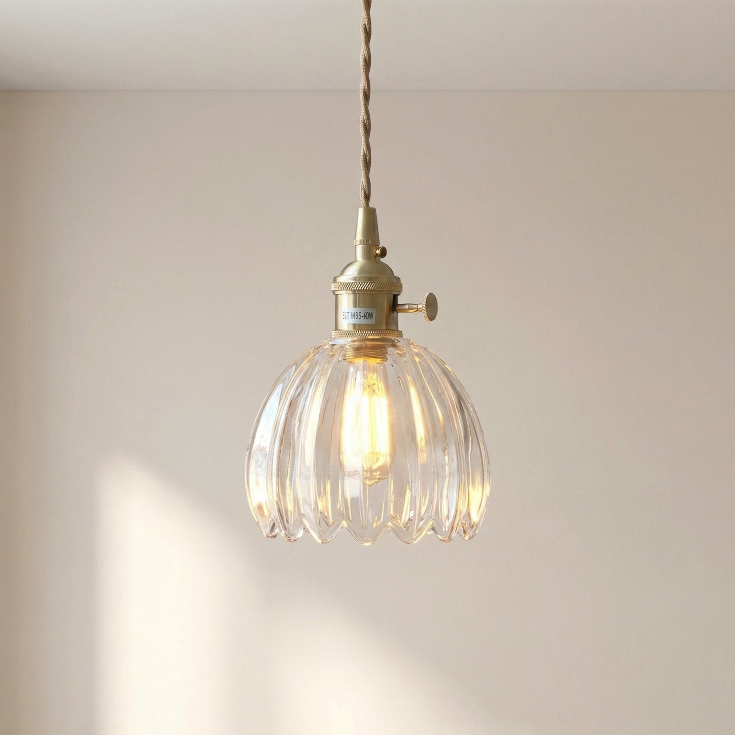 Glass pendant lamp featuring a minimalist Japanese design, adjustable height, perfect for modern kitchen lighting. 6