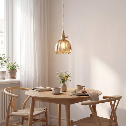 Glass pendant lamp featuring a minimalist Japanese design, adjustable height, perfect for modern kitchen lighting. 3