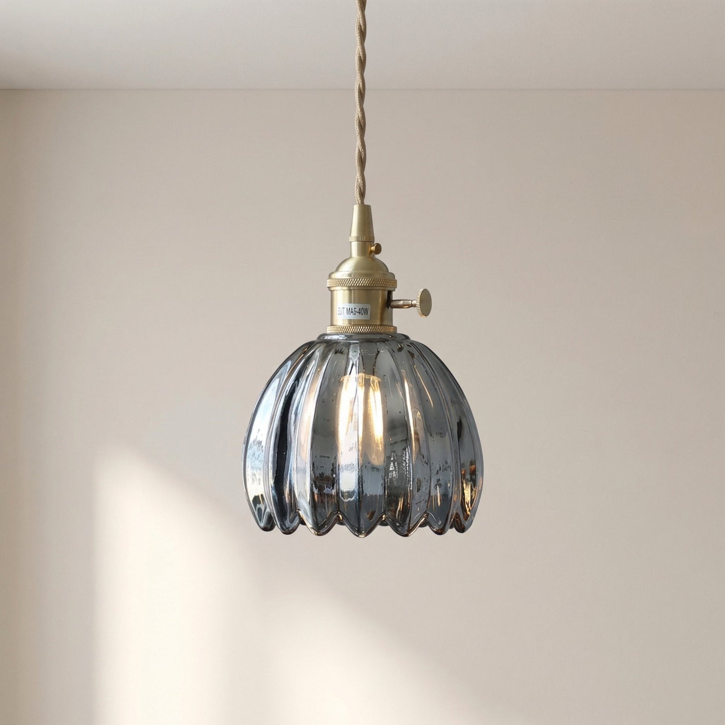 Glass pendant lamp featuring a minimalist Japanese design, adjustable height, perfect for modern kitchen lighting. 8