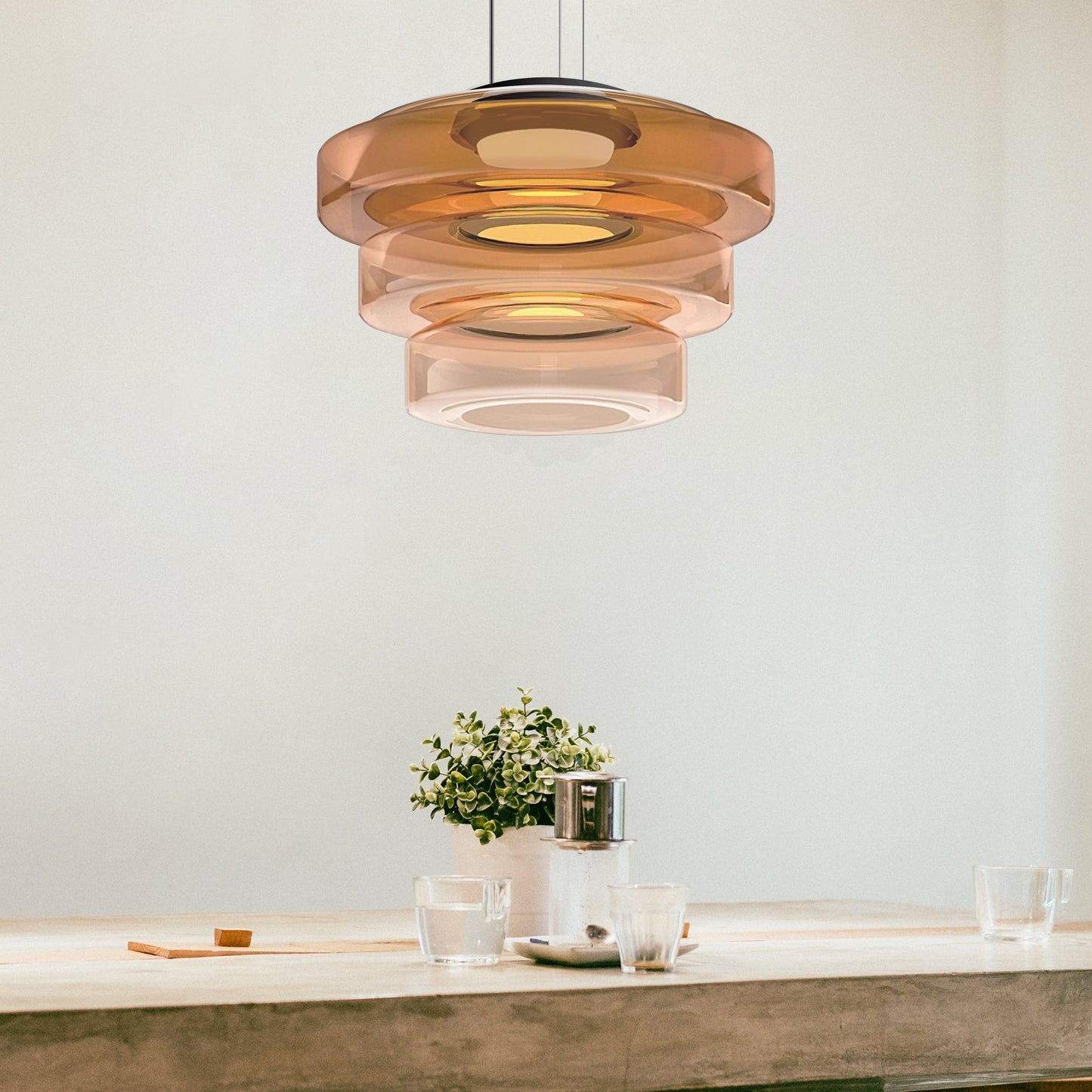 Elegant glass pendant lamp featuring a Bauhaus design, perfect for kitchen lighting, available in smoke grey, green, or orange. 3