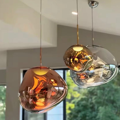 Glass pendant lamp featuring a minimalist design, made from tempered glass and metal, perfect for modern kitchen pendant lighting. 3