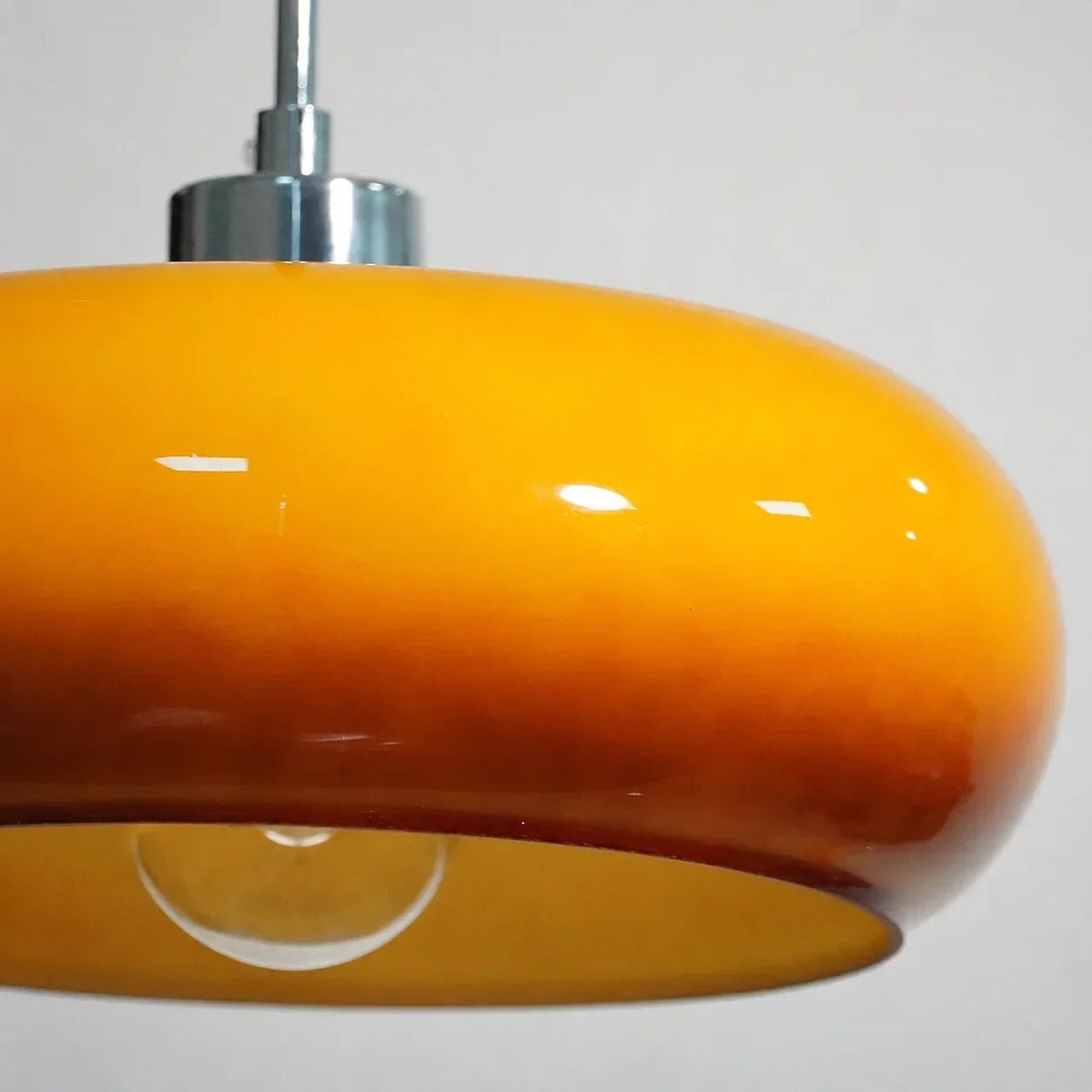Glass pendant light featuring a minimalist Bauhaus design, perfect for illuminating kitchen islands and enhancing modern interior spaces. 3