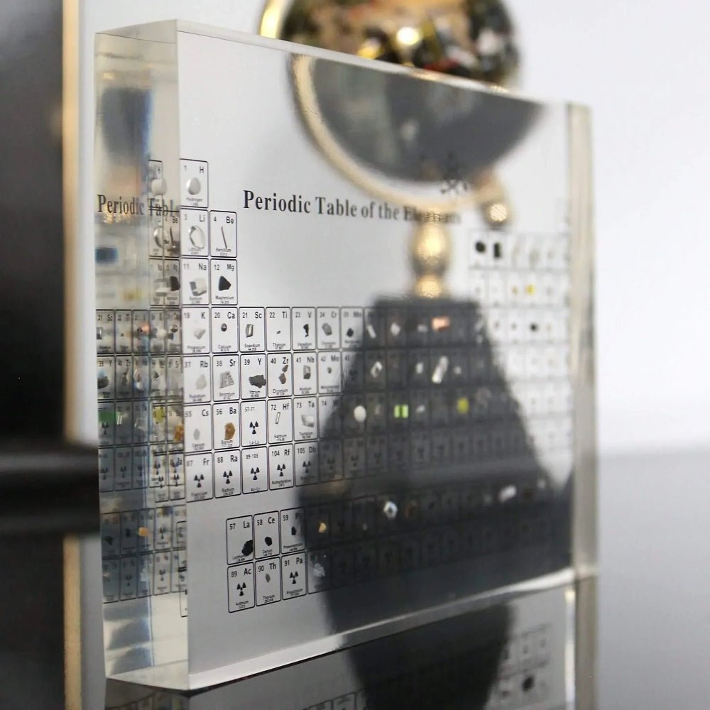 Glass periodic table display featuring real element samples, ideal for educational chemistry decor in classrooms and study spaces. 2