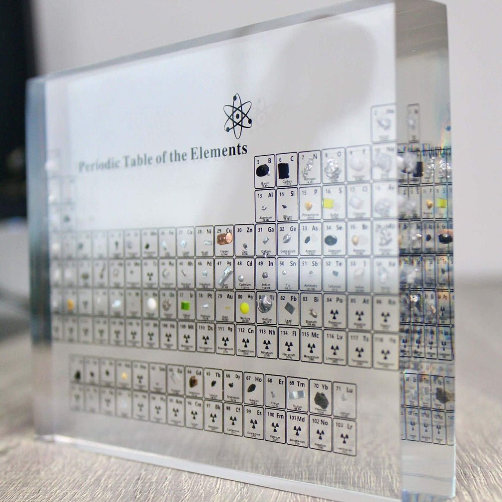 Glass periodic table display featuring real element samples, ideal for educational chemistry decor in classrooms and study spaces. 1