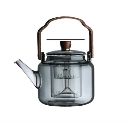Elegant smoked glass teapot with infuser and wooden lid, perfect for brewing 1.2L of tea, combining style and functionality. 6