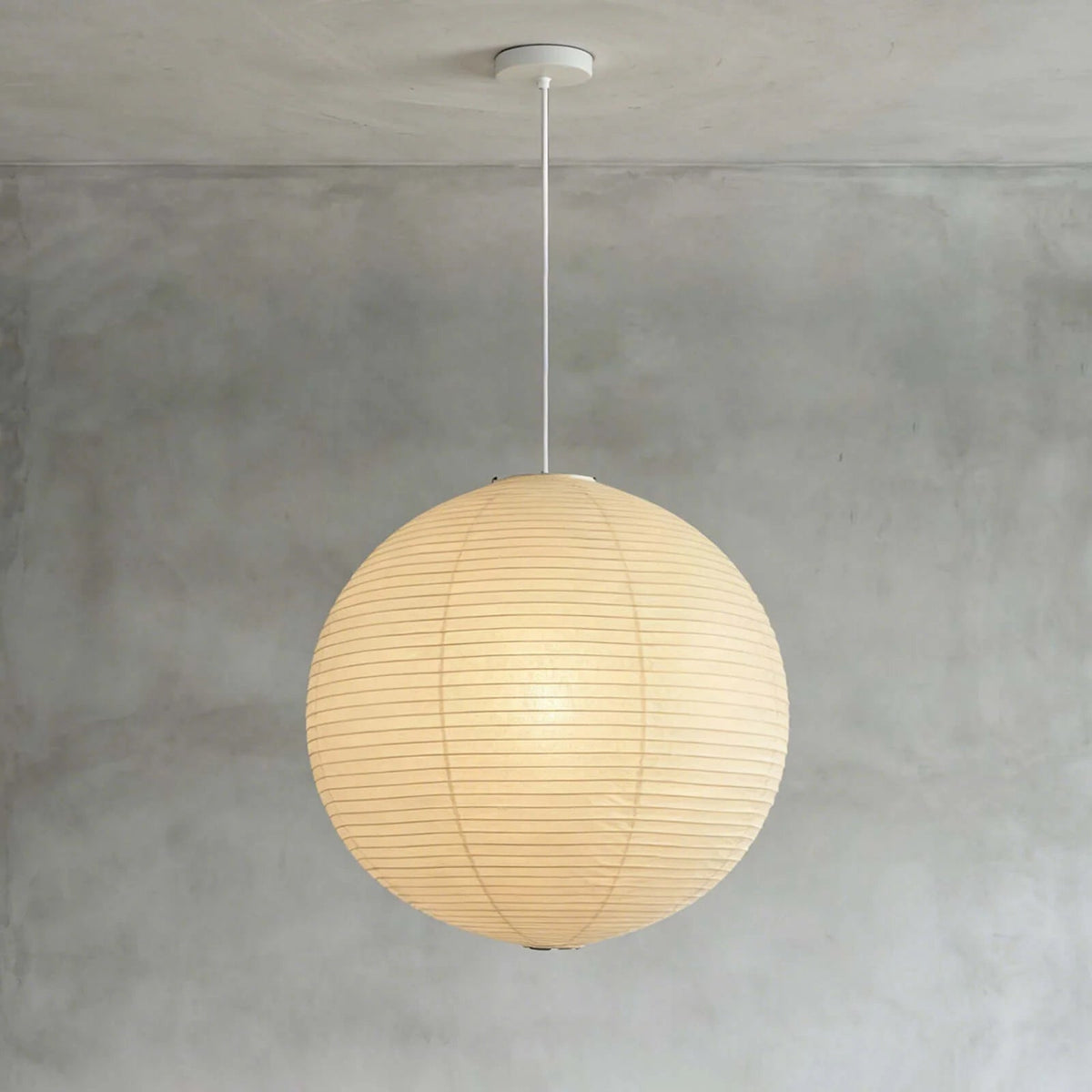 Modern black globe pendant light featuring an adjustable cord and elegant washi paper shade, perfect for enhancing indoor spaces with a contemporary touch. 0