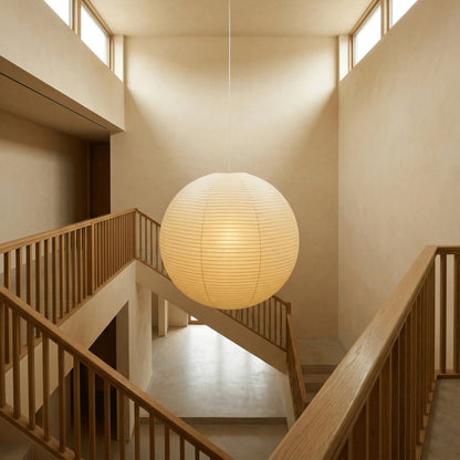 Modern black globe pendant light featuring an adjustable cord and elegant washi paper shade, perfect for enhancing indoor spaces with a contemporary touch. 7