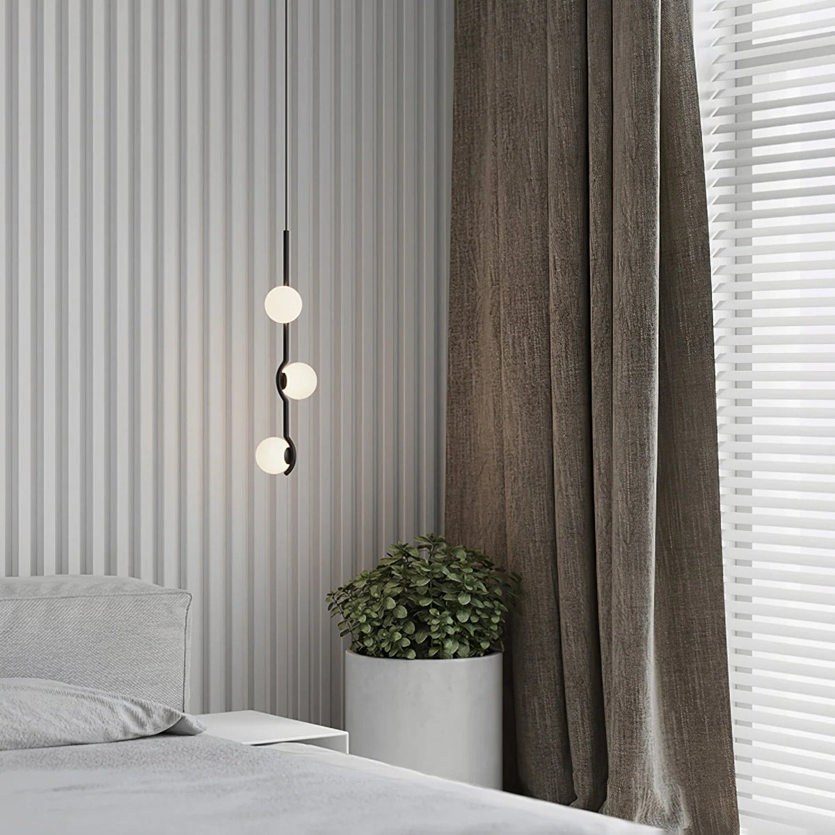 Globe pendant light featuring a modern white glass shade and sleek metal design, adjustable height for kitchen island or dining room illumination. 6